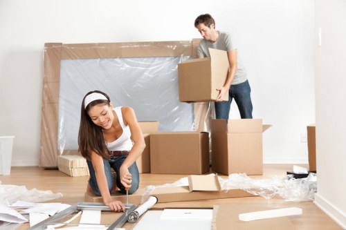 Packed office furniture and equipment ready for local relocation in Brompton