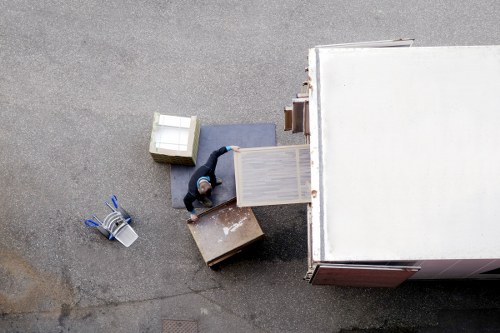 Professional man with van in Brompton transporting furniture
