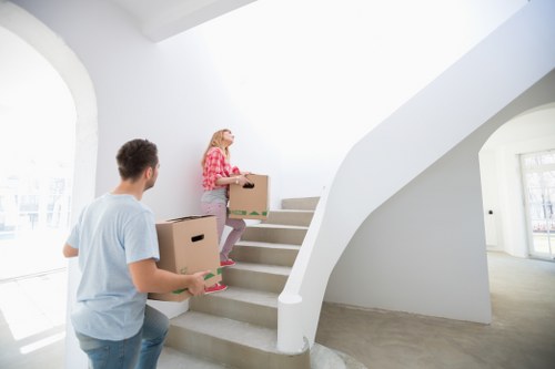 Loading furniture into a moving van in Brompton