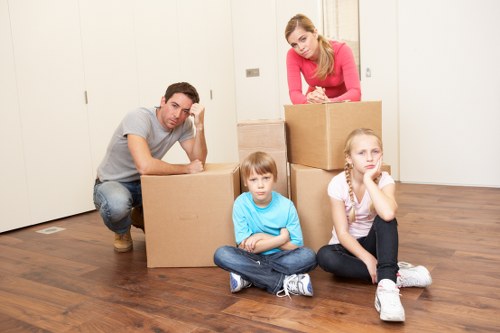 Loading boxes and furniture into a removal van in Brompton