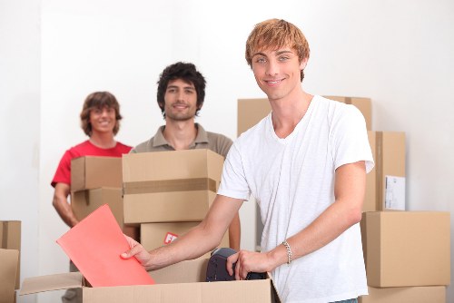 Commercial movers transporting office equipment in Brompton