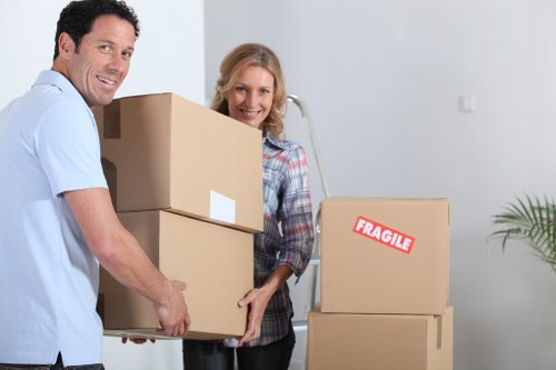 Local moving team handling furniture in Brompton